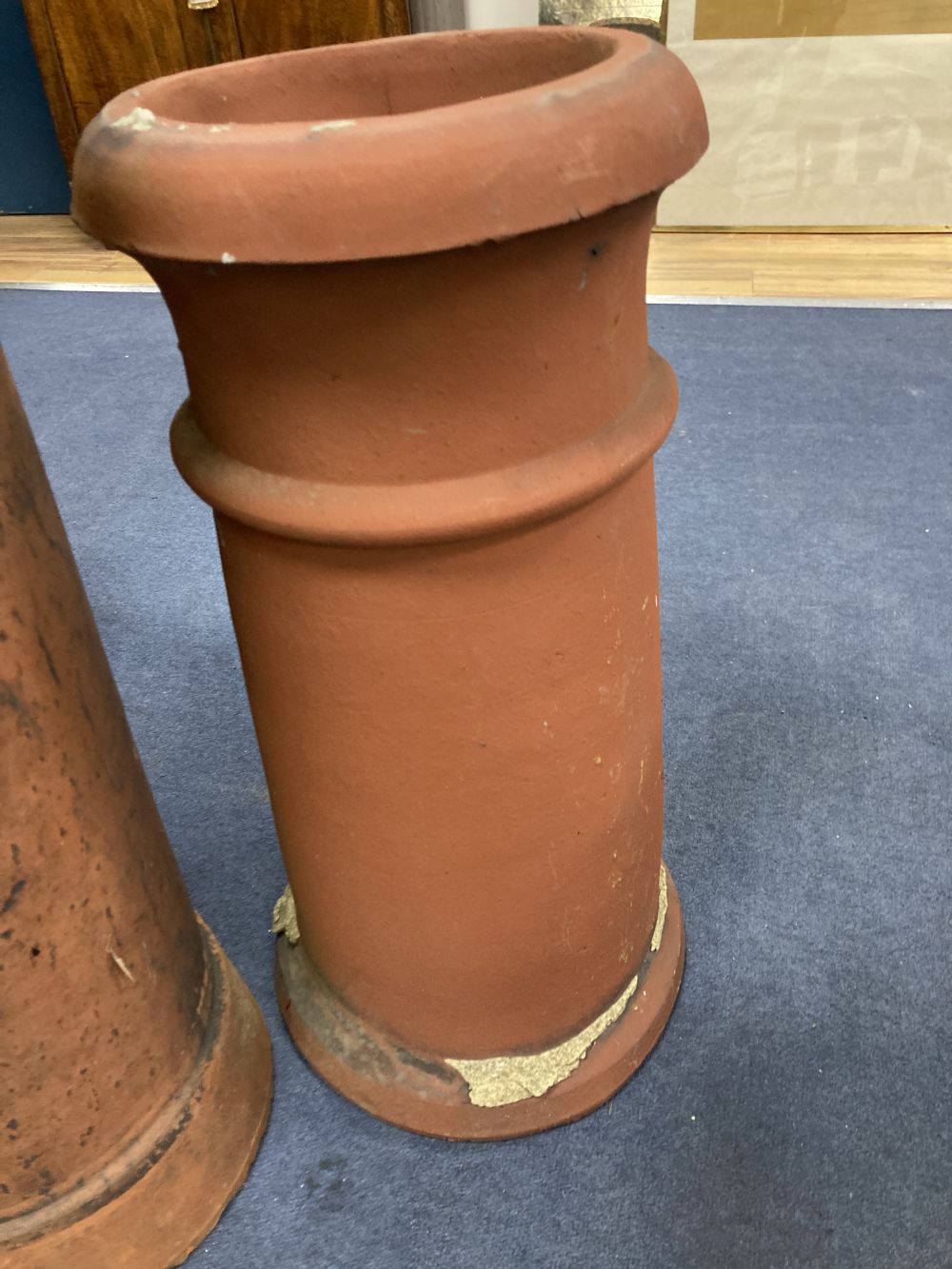 Two terracotta chimney pots, tallest 77cm